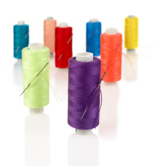 Colorful Thread Spool Needle White Background