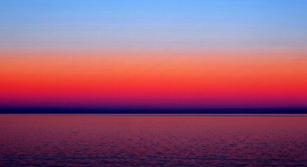 Fototapeta premium Minimalist ocean sunrise gradient with soft pink gold and blue hues spreading across a vast calm horizon