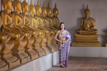 Portrait woman in Thai traditional dress costume  in Ayutthaya , Thailand
