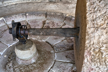 Artisanal process: agave hearts under the stone wheel