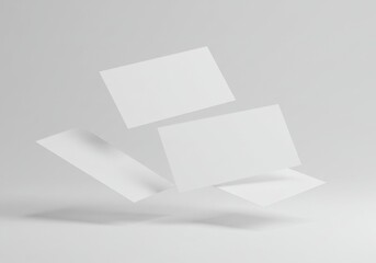 White business cards mockup floating in a minimalist space isolated on white background