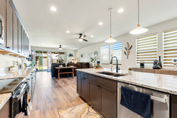 Spacious kitchen with a large island and modern stainless steel appliances