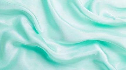Obraz premium Turquoise silk fabric, soft waves, abstract background, for textile design, or web design element