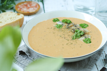 A bowl with mushroom cream soup	