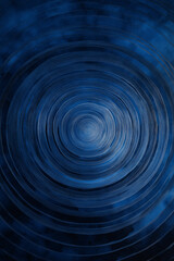 Obraz premium deep ultramarine abstract artwork featuring concentric circular patterns that create a wave-like gradation effect.