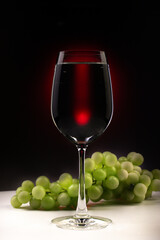wine and grapes. Drink water for health concept. Clean water as clear as crystal glass on black background with green light.