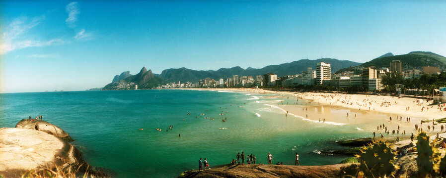 Tourists on the beach, Ipanema Beach, Rio de Janeiro, Brazil.