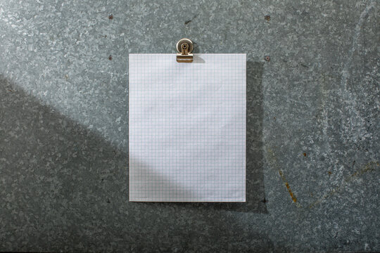 Blank white graph paper on magnet board