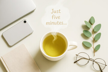 Tea Break Scene With Steam Saying “Just Five Minutes” On Minimal Desk. Concept For Mindful Pauses, Digital Detox, Work-Life Balance, Wellness Rituals, And Calm Productivity Visual Aesthetic