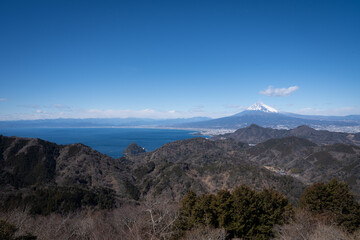 very beautiful landscape view of fuji mountain from top view that we can see mountain ridge ,sea and fujisan at Izu panorama rope way shizuoka Japan  
