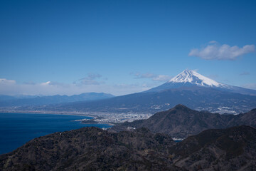 very beautiful landscape view of fuji mountain from top view that we can see mountain ridge ,sea and fujisan at Izu panorama rope way shizuoka Japan  