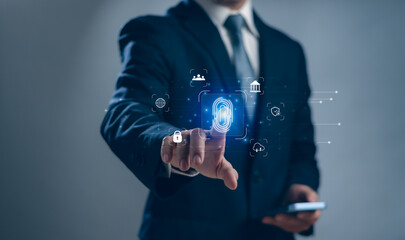 Concept of secure technology security,cyber privacy protection.businessman are scanning fingerprint on virtual screen to authenticate their identity log in to make transactions on internet online