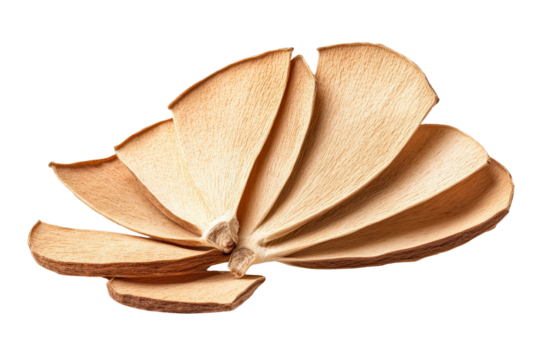 Close up of dried bael fruit slices arranged in a fan like pattern on a wooden surface  Bael is a tropical fruit commonly used in Ayurvedic medicine and Indian cuisine
