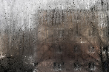 Condensation on wet glass. background. abstract background of water droplets on wet glass