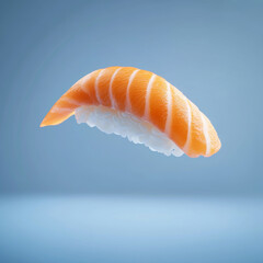salmon nigiri sushi - japanese food style on  blue  background in motion, Falling beautiful nigiri piece of salmon and rice