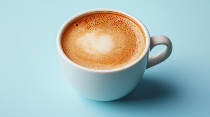 Obraz premium cup of freshly brewed coffee with beautiful frothy top sits on light blue background, creating calming and inviting atmosphere