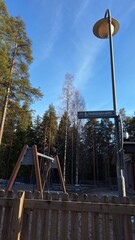 a sign with the street name in Finnish
