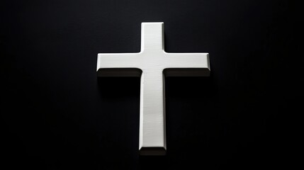 Silver cross pendant on black background christian faith religious symbol jesus christ crucifixion symbol