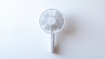 hand held plastic fan isolated on white background white clipping path
