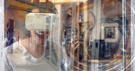 Hands interacting with futuristic digital interface over server room