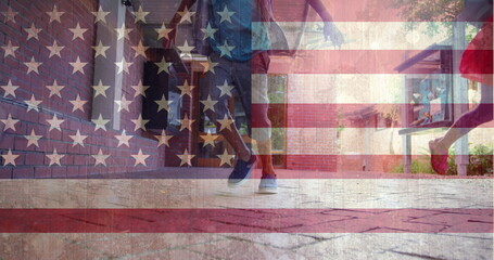 Digital composite of children running on school ground against american flag background