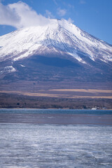 ice lake with huge snow cap Fuji mountain in winter season 
Japan