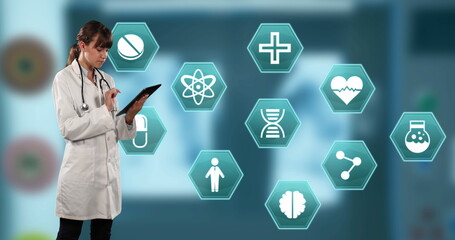 Image of hexagon medical icons over female doctor using tablet