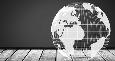 Image of white globe spinning with copy space on grey background