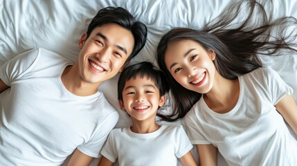 Fototapeta premium Happy Family Portrait on Bed with Joyful Expressions