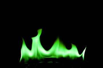 Vibrant Green Flames Dancing Against a Dark Background