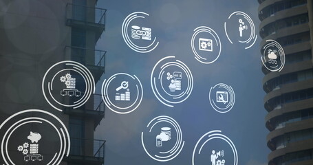 Image of digital icons over modern buildings in background