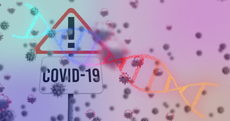 Image of warning road sign and covid 19 text over covid 19 cells and dna strand spinning