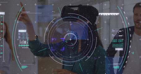 Data processing and scope scanning over woman wearing vr headset gesturing at office