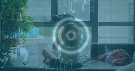 Image of scope scanning and processor elements over woman wearing vr headset