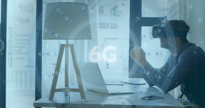 Image of 6g text and scope scanning over man wearing vr headset