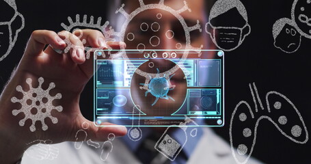 Multiple covid-19 icons floating against caucasian male doctor holding futuristic screen