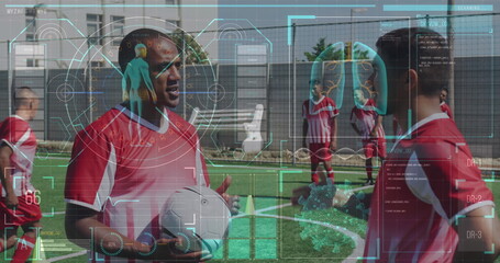 Digital interface with medical data processing against two male soccer players talking on grass turf