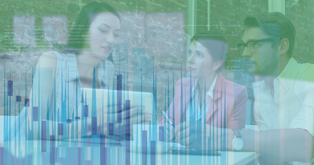 Statistical data processing against office colleagues discussing over digital tablet at office