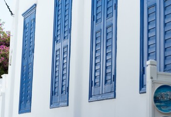 Blue Shutters on Greek Whitewashed Architecture