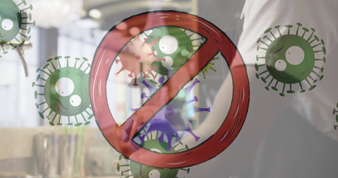 Stop sign over covid-19 cells against man wearing face mask cleaning bar counter with disinfectant - Powered by Adobe