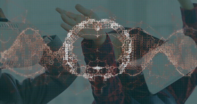 Image of human brain and dna strand over business people wearing vr headsets - Powered by Adobe