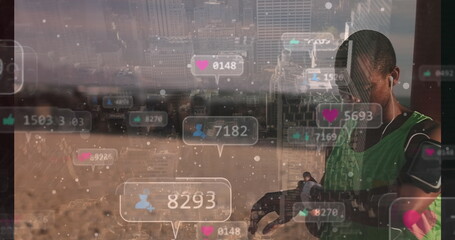 Image of social media icons over man using smartwatch and cityscape