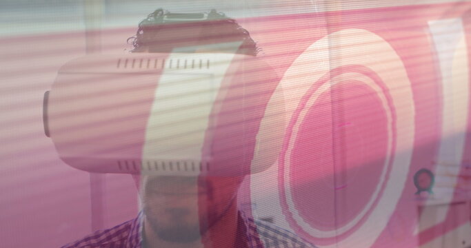 Image of scope scanning with glitch and man using vr headset