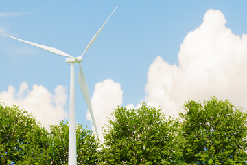 Wind turbine against a blue sky. 3d rendering