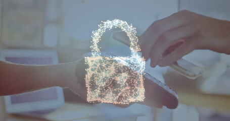 Image of network security padlock over people using payment terminal