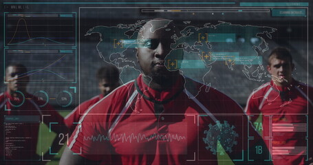 Soccer players in red jerseys training with digital data overlay on field