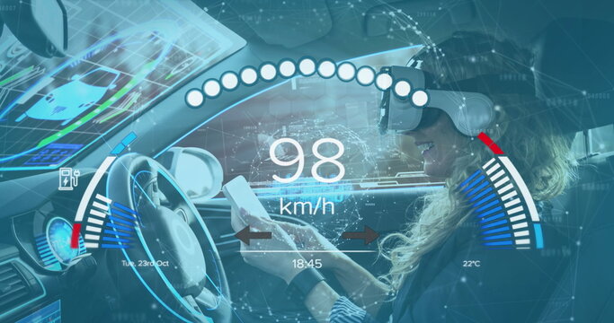 Image of interface with charging battery icon and speedometer over woman with vr headset