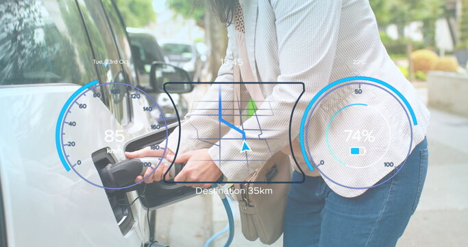 Image of interface with charging battery icon and speedometer over woman fueling car