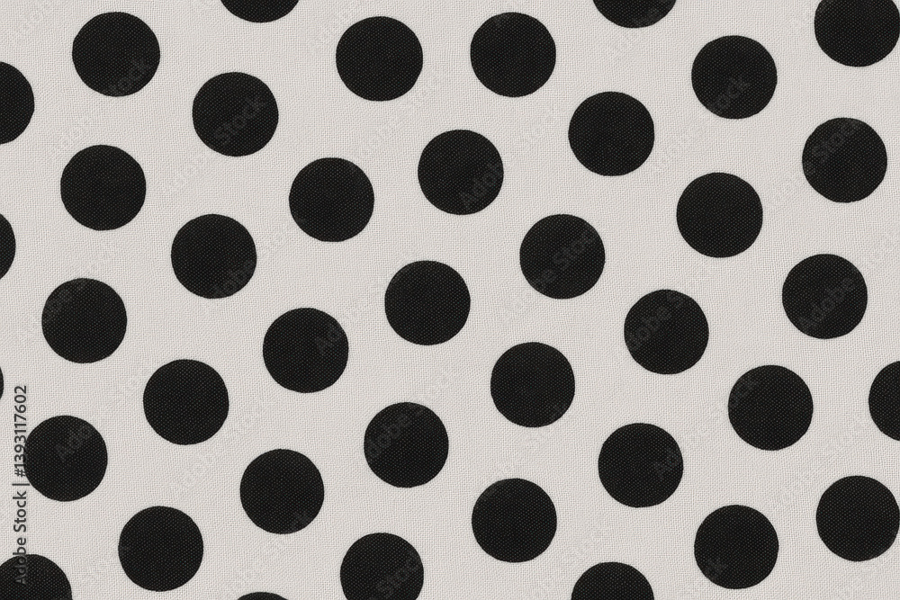 Poster a fabric pattern black polka dots on a light background, creating a classic and playful design.