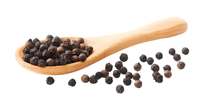A wooden spoon with black peppercorns scattered on a white background